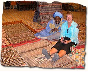 Shopaholic buying rugs in Morocco