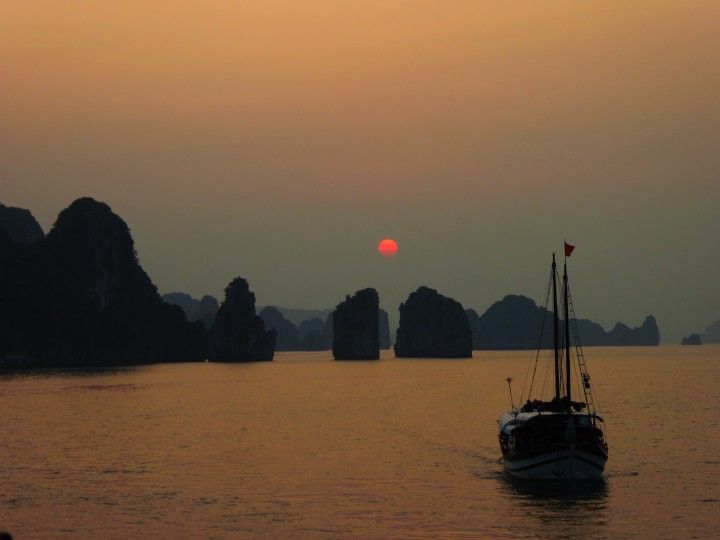 Sunset from the rooftop deck of our boat on Halong Bay - hard to beat! ©Venus Adventures